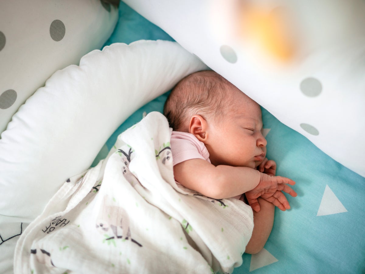Is co-sleeping ever safe? US experts update advice for first time in six years