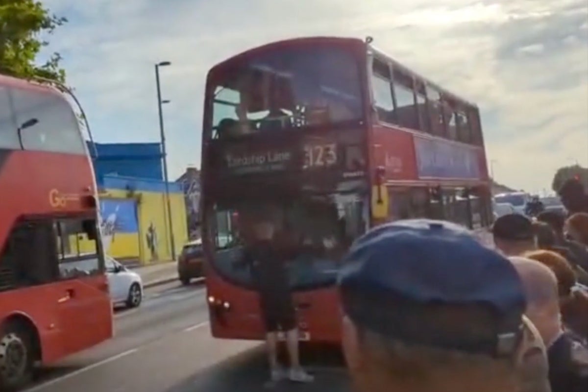 Angry commuter blocks bus too full to take new passengers during rail ...