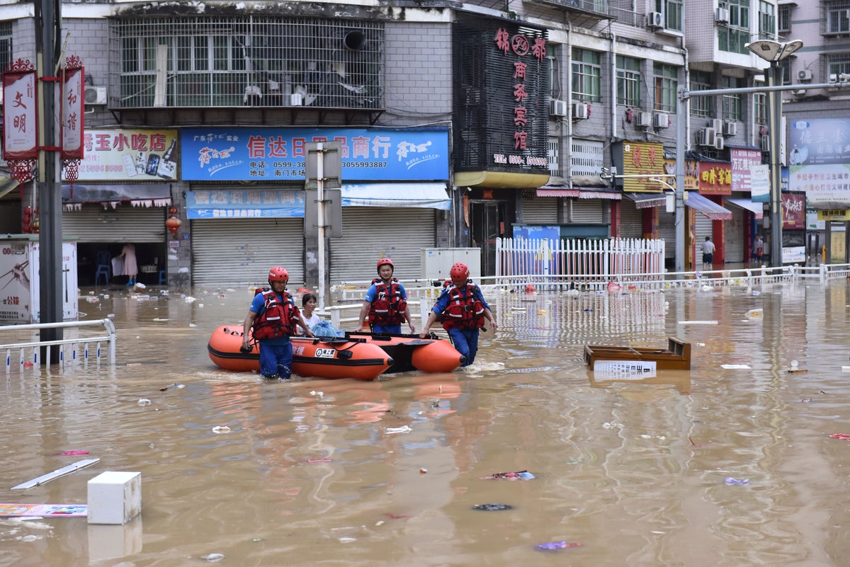 South China floods force tens of thousands to evacuate