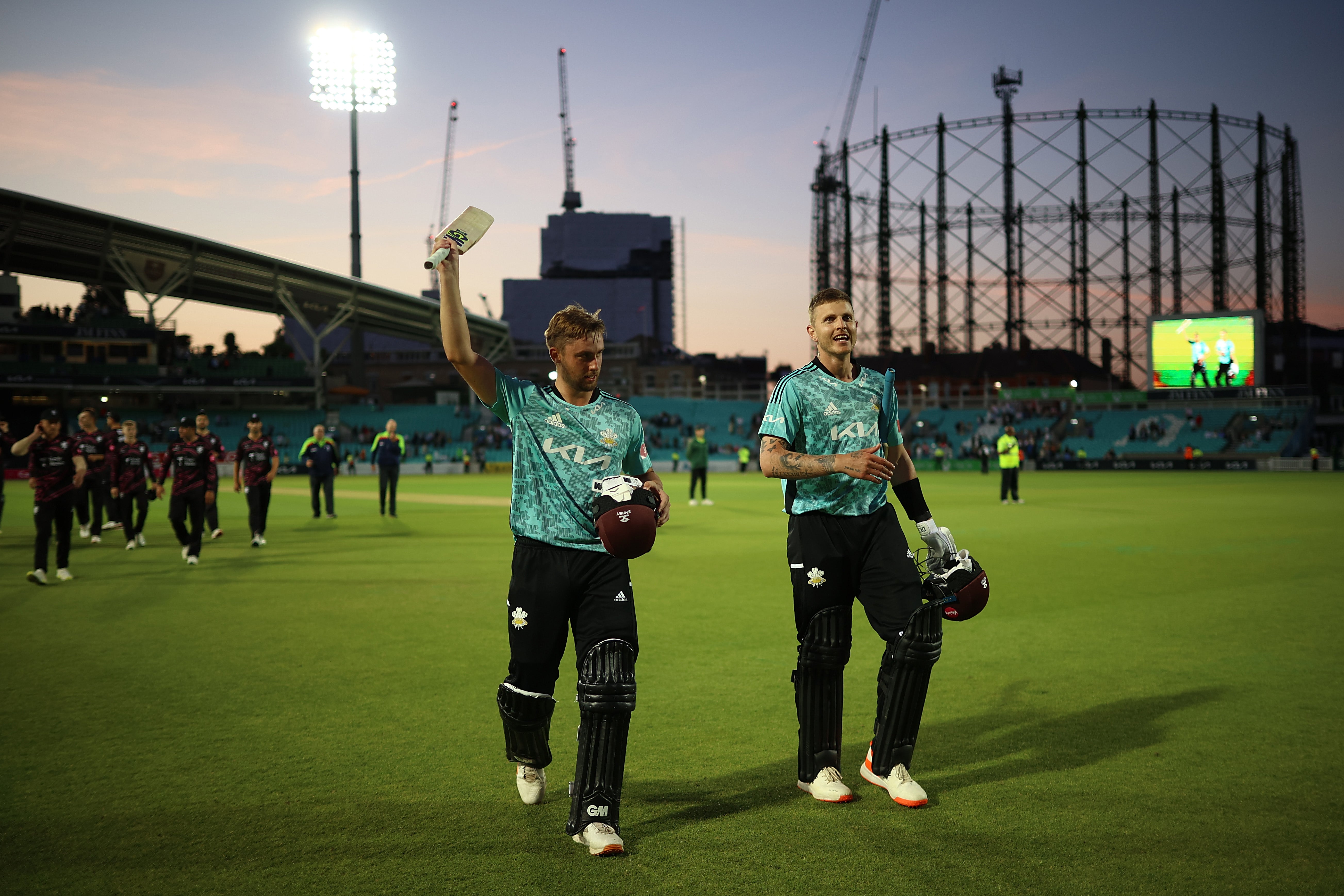 Surrey’s Conor McKerr and Will Jacks leave the field