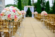 Woman ‘ruins’ neighbour’s wedding day by mowing the lawn as bride walks down the aisle 