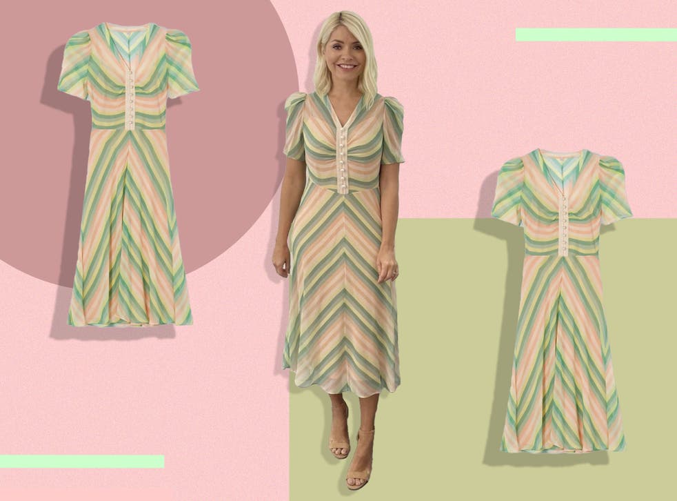 <p>The midi dress has puff sleeves and oversized pearls nodding to 1930s style</p>