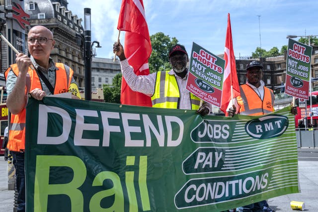 <p>RMT union members picket outside Victoria station on 21 June 2022</p>