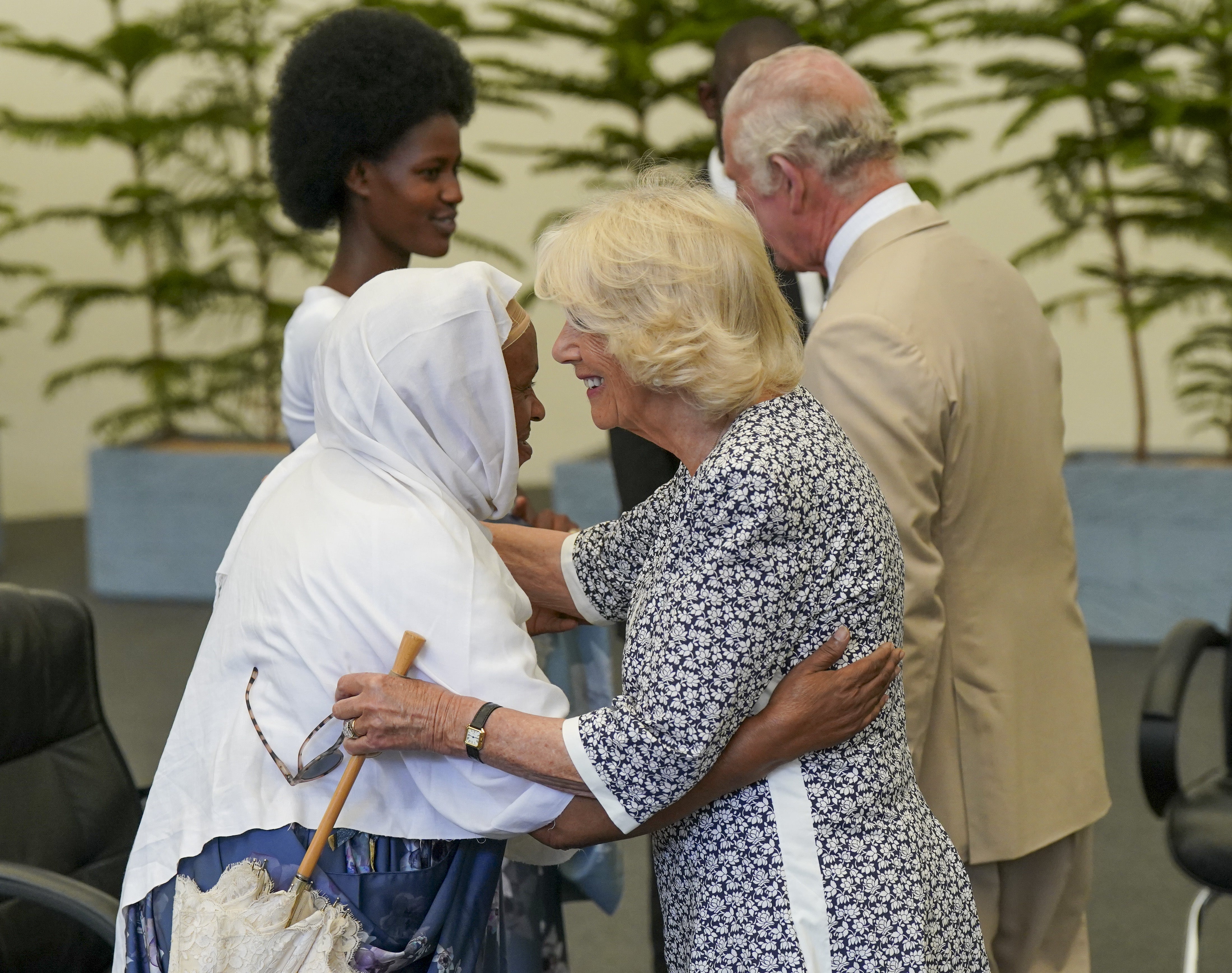 The Duchess of Cornwall hugs genocide survivor Uzamukunda Walida (Arthur Edwards/The Sun/PA)