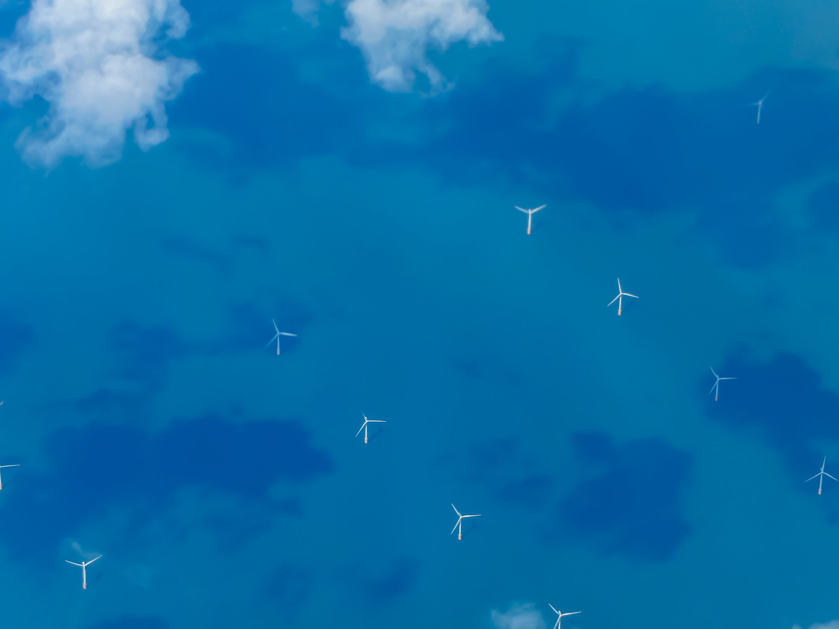 An offshore windfarm photographed from an aeroplane flying over the English Channel