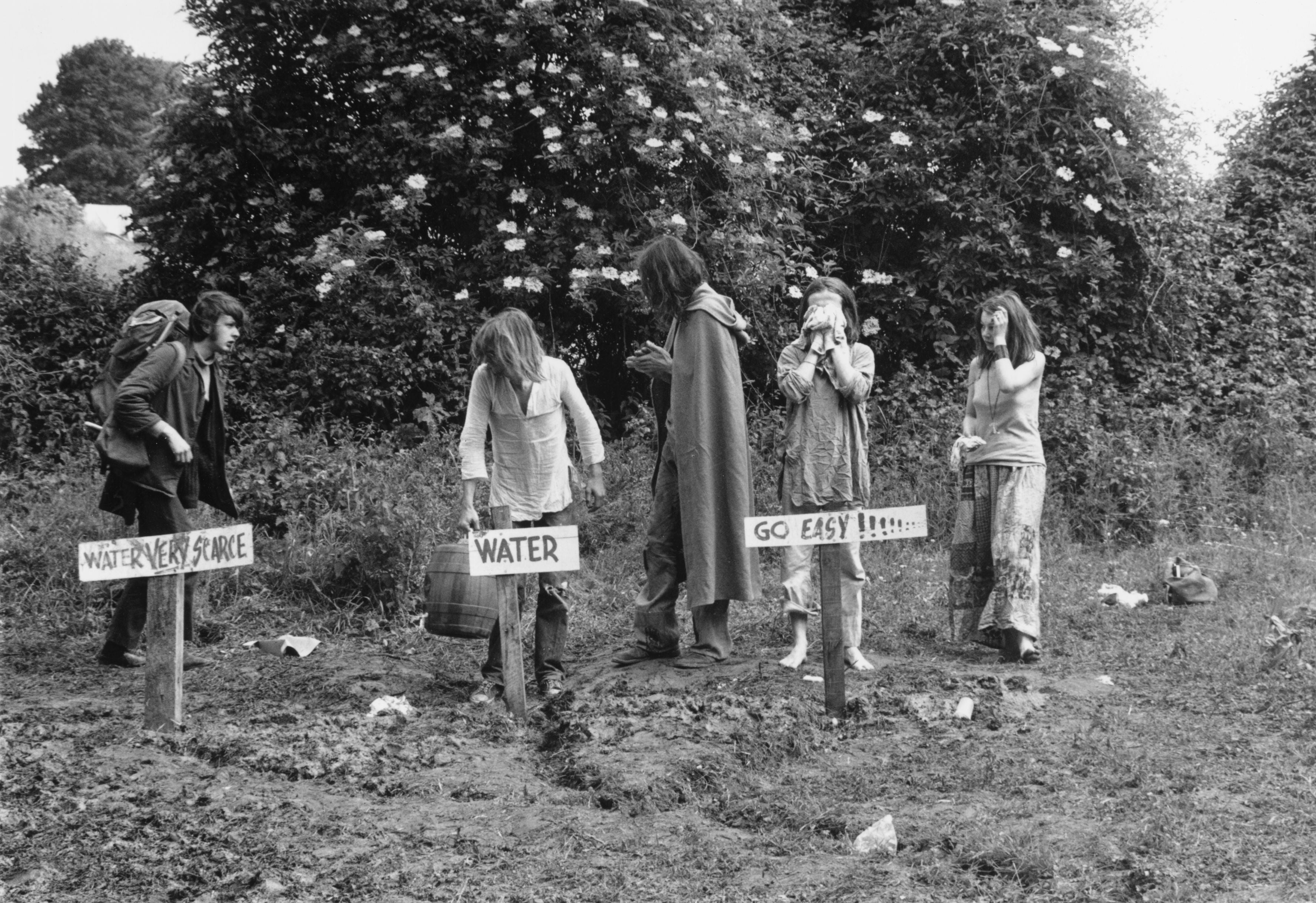 21st June 1971: Festival-goers washing and collecting water at one of the stand pipes at Glastonbury Festival