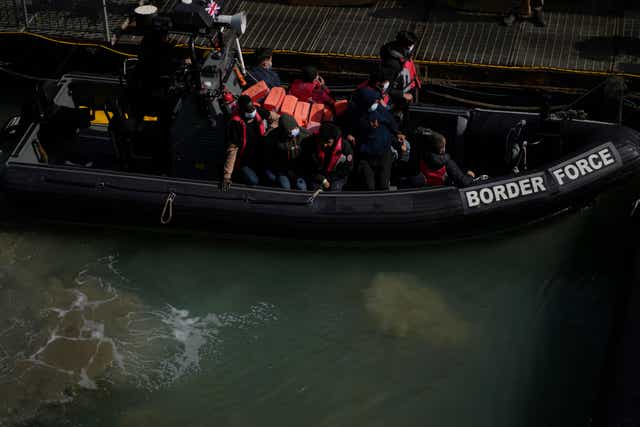 Men thought to be migrants who undertook the crossing from France in small boats and were picked up in the Channel (AP)