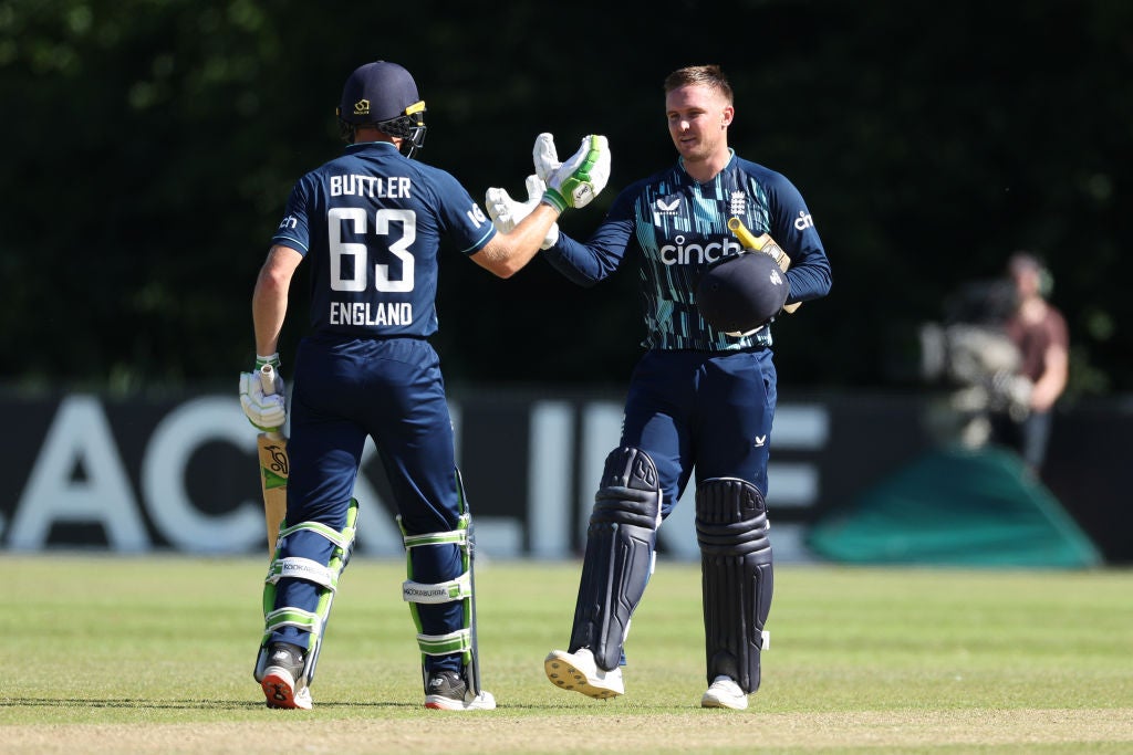 Jason Roy is congratulated by Jos Buttler after reaching a century during the third ODI against Netherlands at VRA Cricket Ground in Amstelveen