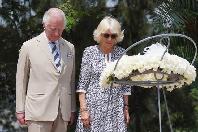 The Prince of Wales and the Duchess of Cornwall after laying a wreath at the Kigali Genocide Memorial (Jonathan Brady/PA)