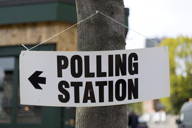 Voters go to the polls in Wakefield, West Yorkshire, and Tiverton and Honiton in Devon on Thursday (Yui Mok/PA)