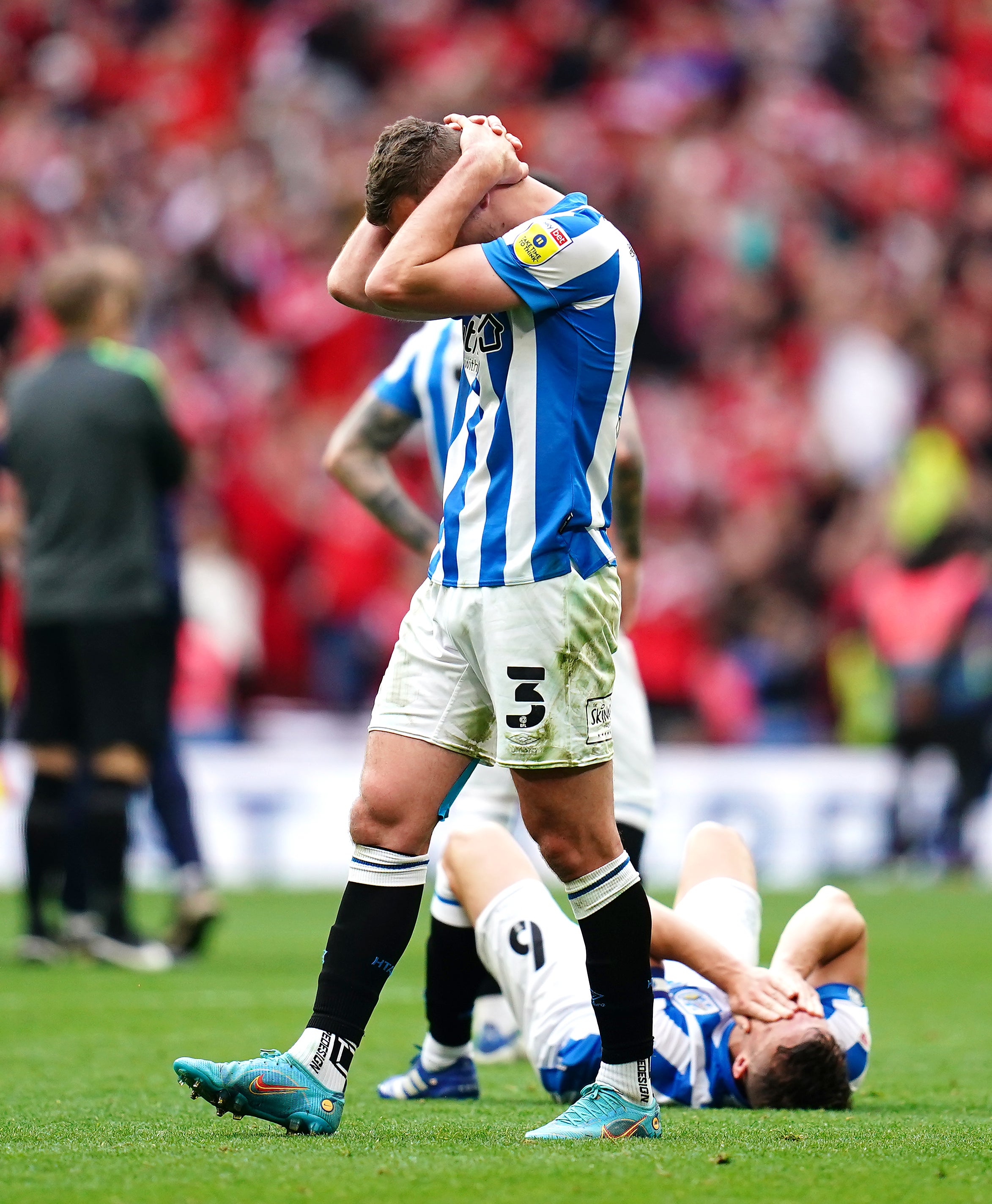 Huddersfield will have to overcome a difficult fixture run in March and April to challenge for promotion again (John Walton/PA)