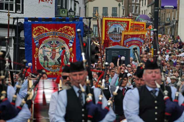 Bands and banner take part in the traditional Durham Miners’ Gala (Owen Humphreys/PA)