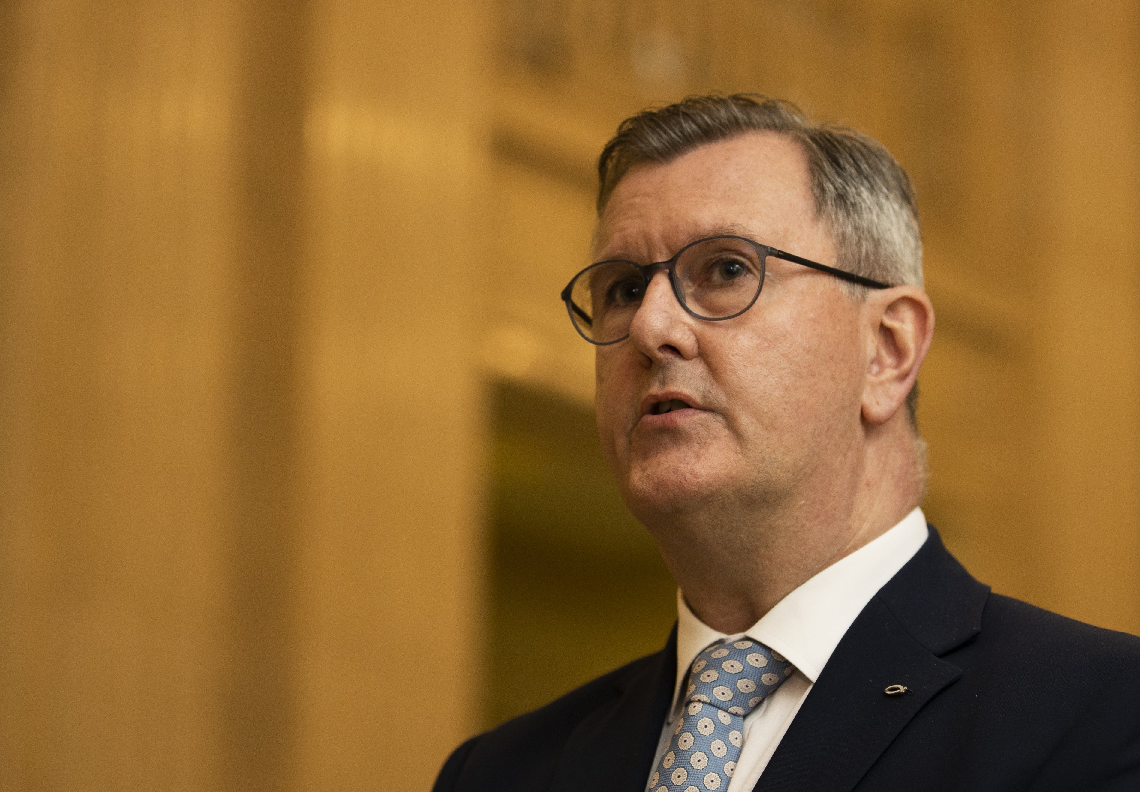 DUP leader Sir Jeffrey Donaldson speaks to the media in the Great Hall at Parliament Buildings, Stormont, Belfast as the Bill to amend the Northern Ireland Protocol is introduced in Parliament amid controversy over whether the legislation will break international law (Liam McBurney/PA)