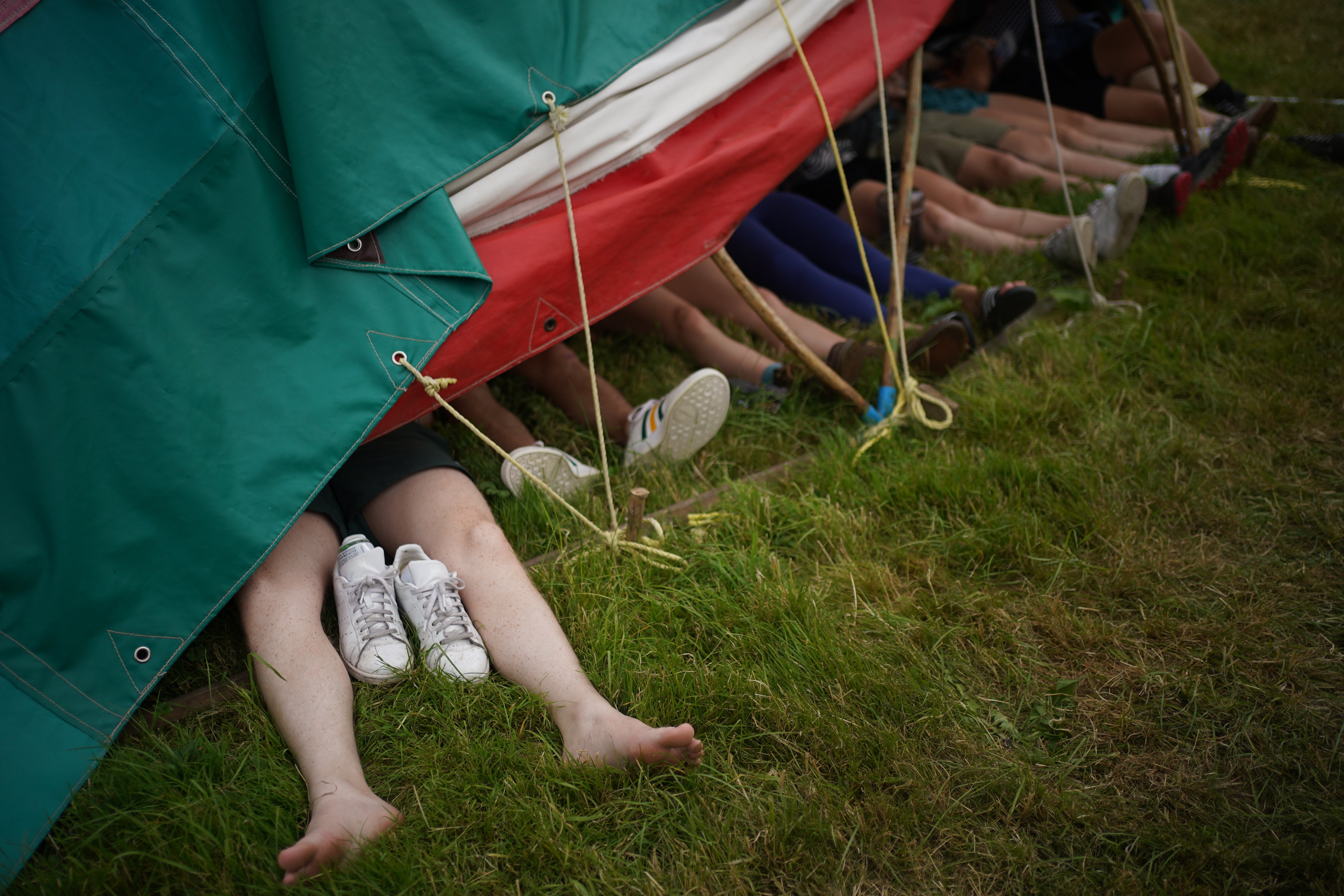 Revellers may be forced to take shelter if storm clouds gather as expected (Yui Mok/PA)