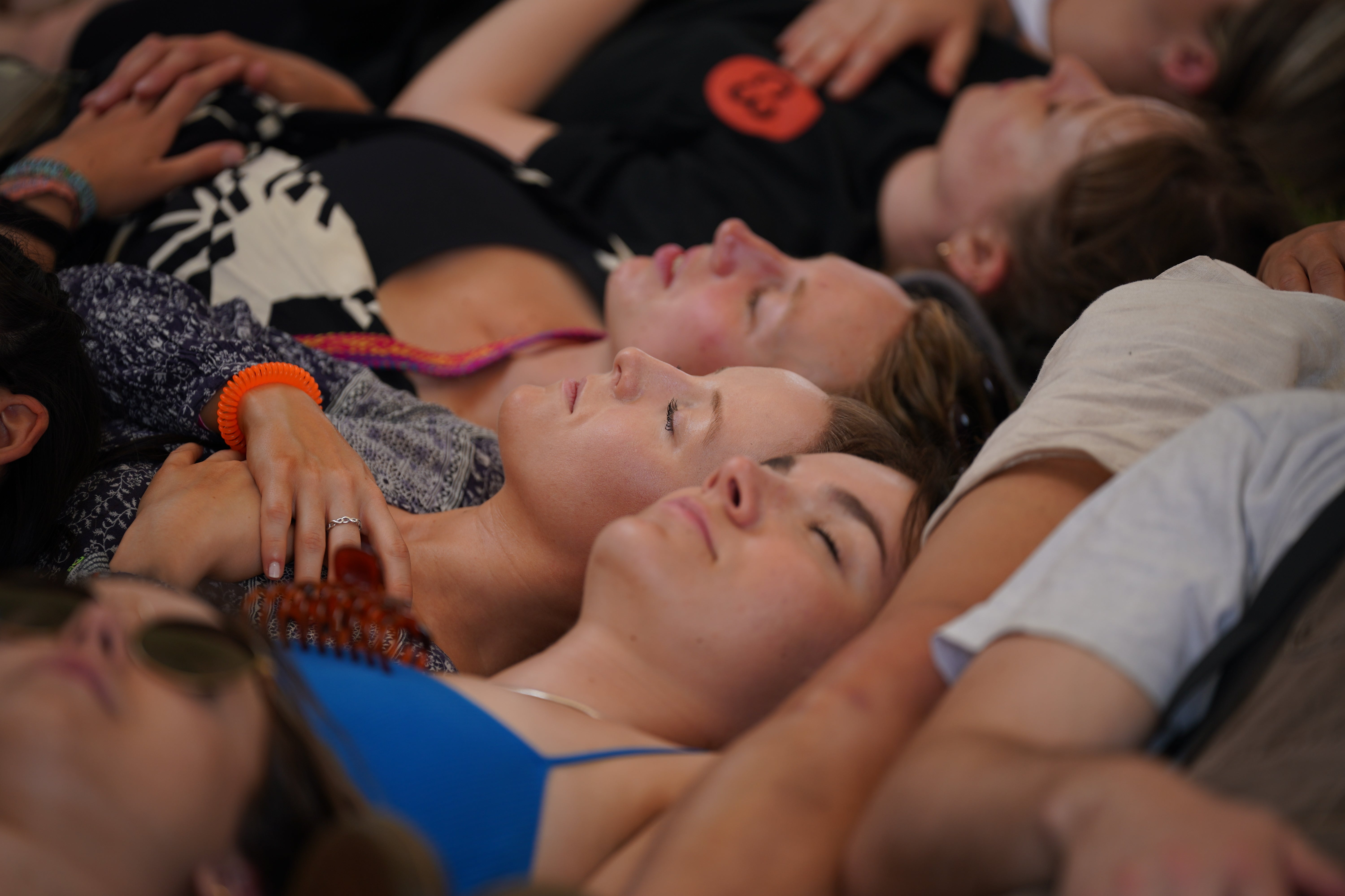 Laughter yoga involves prolonged voluntary laughter (Yui Mok/PA)