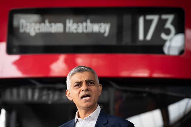 <p>Sadiq Khan speaks to the media at West Ham bus depot in east London</p>