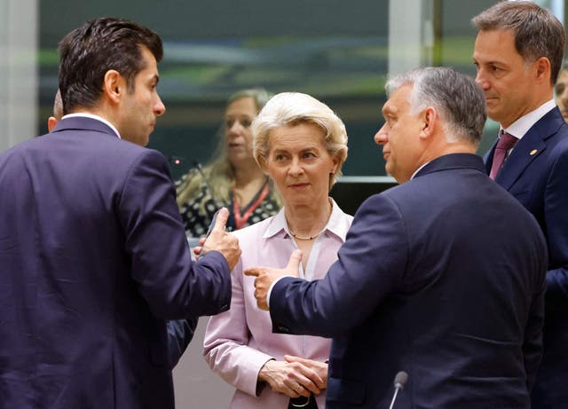 <p>Bulgaria’s prime minister, Kiril Petkov, speaks with president of the European Commission Ursula von der Leyen, Hungary’s prime minister, Viktor Orban, and Slovakia’s prime minister, Eduard Heger, in Brussels </p>
