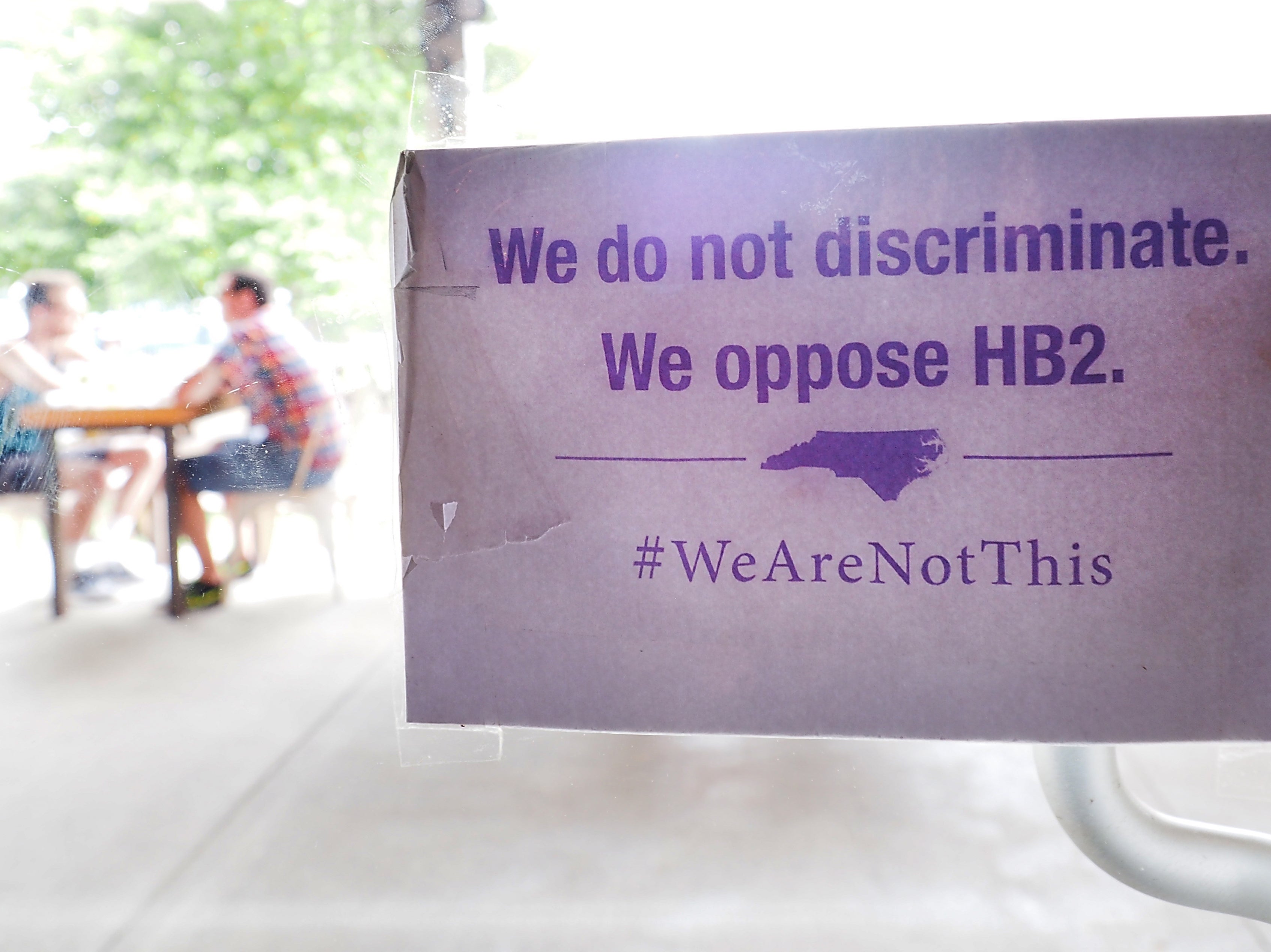 A sign protesting North Carolina’s HB2 law at Bull McCabe’s Irish Pub in Durham, North Carolina, 2016