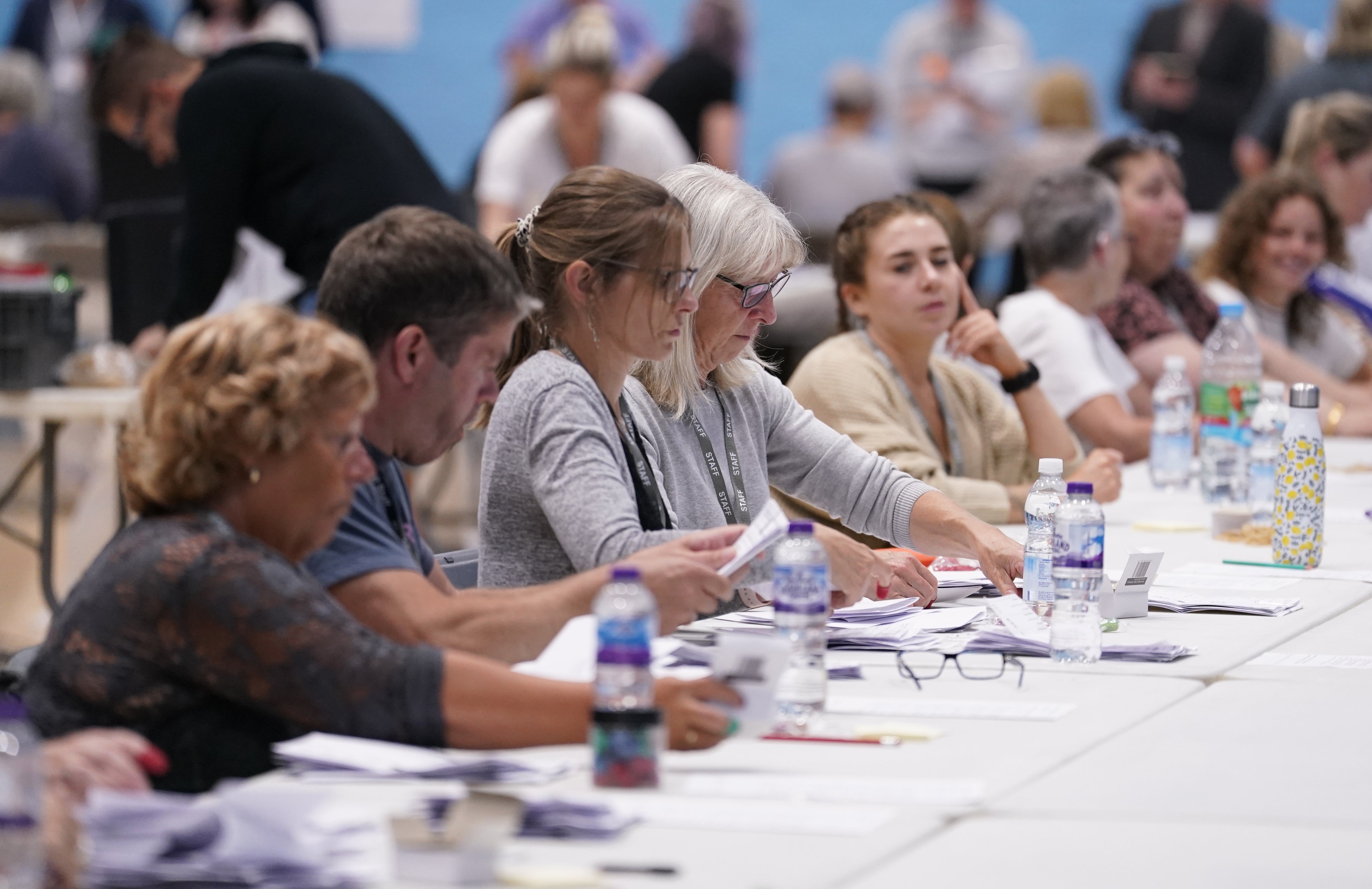 Votes are counted at the Lords Meadow Leisure Centre, in Crediton, Devon, for the Tiverton and Honiton by-election which was triggered by the resignation of MP Neil Parish for watching pornography in the Commons. Picture date: Thursday June 23, 2022.