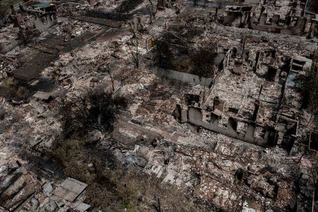 <p>An aerial view shows destroyed houses after strike in the town of Pryvillya at the eastern Ukrainian region of Donbas </p>