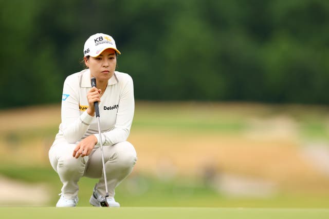 <p>In Gee Chun lines up a putt on the ninth green</p>
