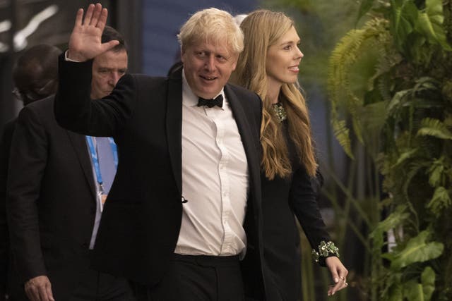 Prime Minister Boris Johnson and his wife Carrie Johnson attend a banquet in Kigali (Dan Kitwood/PA)