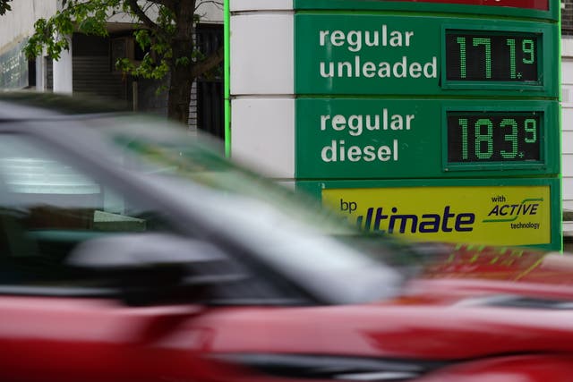 Around 45% of Britons said they cut back on car journeys over the past fortnight after witnessing a surge in fuel prices, according to new figures (PA)