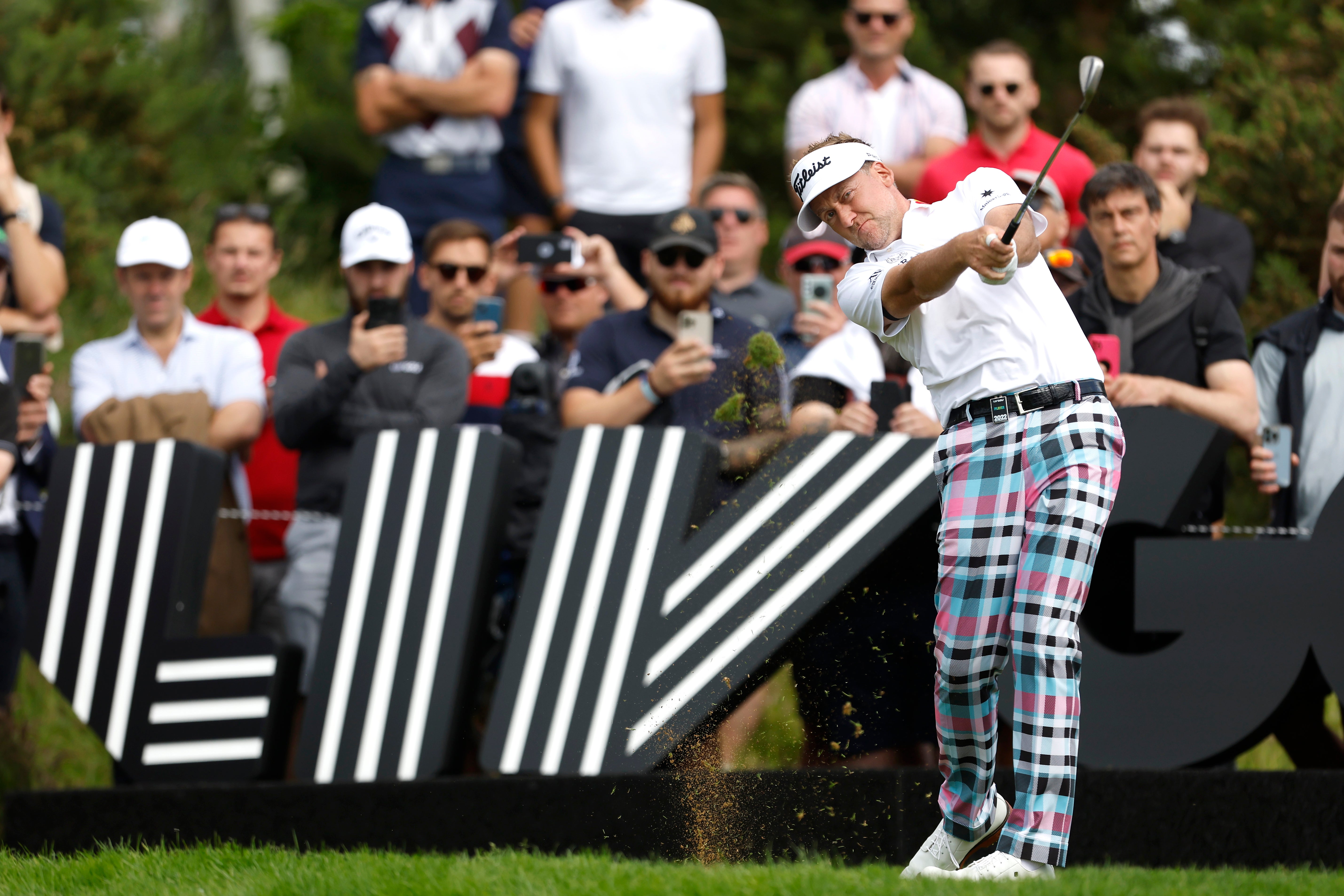 Ian Poulter plays in the inaugural LIV Golf event