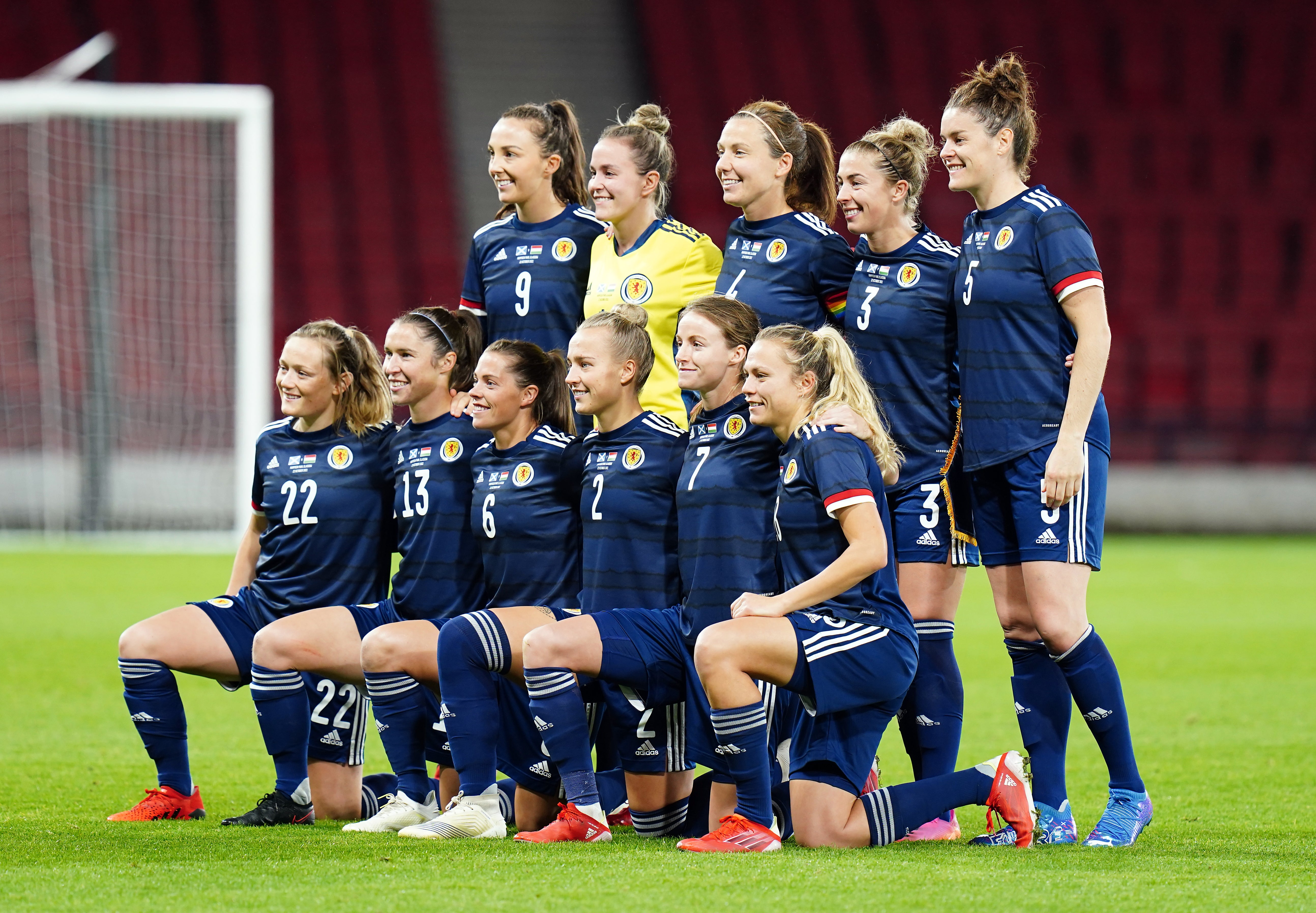 A schoolgirl was surprised by her favourite Scottish player, Arsenal Women defender Jen Beattie, far right, after visiting the Scotland National team’s training ground (Jane Barlow/ PA)