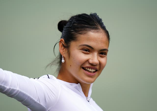 Emma Raducanu stretches before practice at Wimbledon on Friday (Adam Davy/PA)