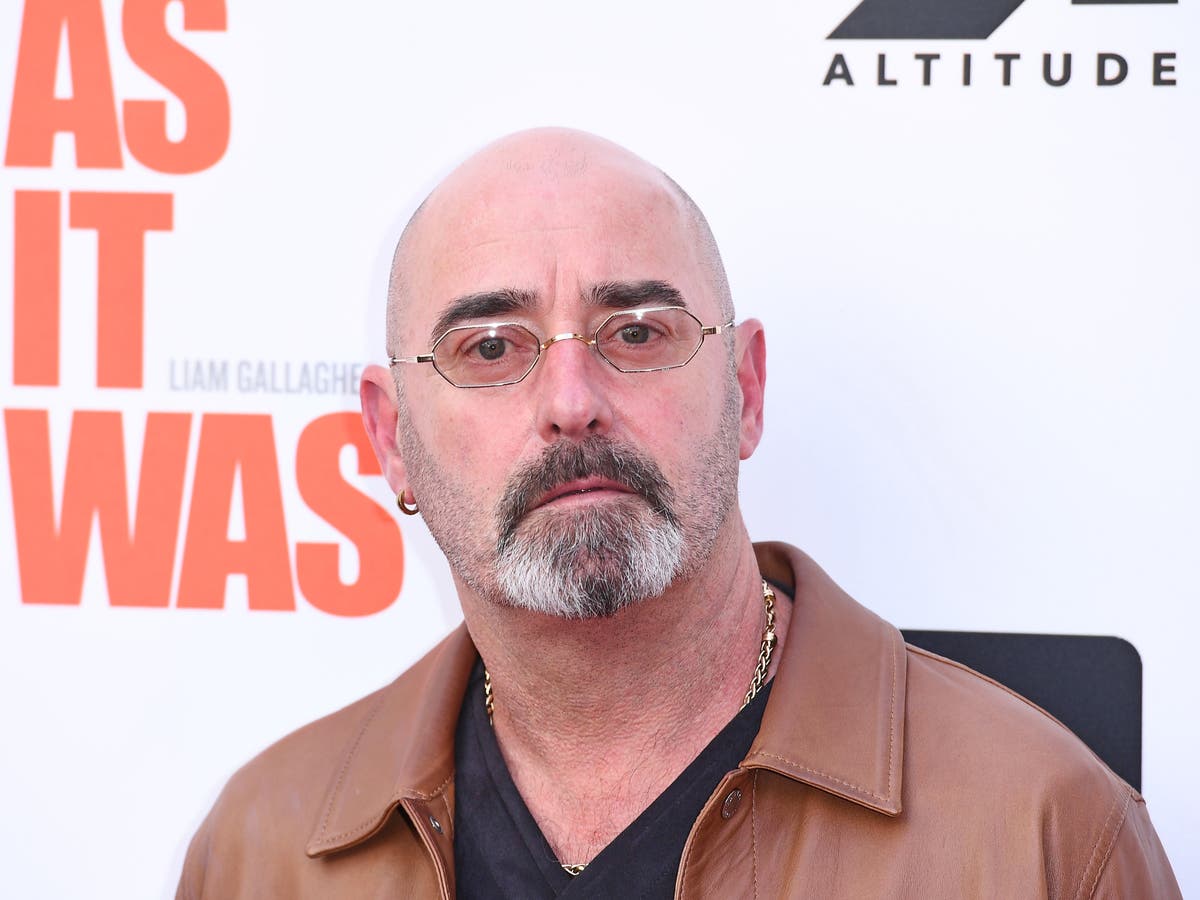 Oasis guitarist Bonehead given cancer all-clear: &lsquo;Into recovery now and see you all soon&rsquo;