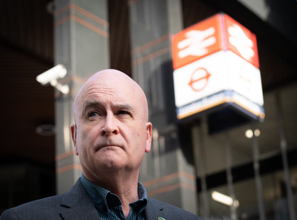 The RMT general secretary, Mick Lynch, on a picket line outside Euston station in London as members of the Rail, Maritime and Transport union strike (Stefan Rousseau/PA)