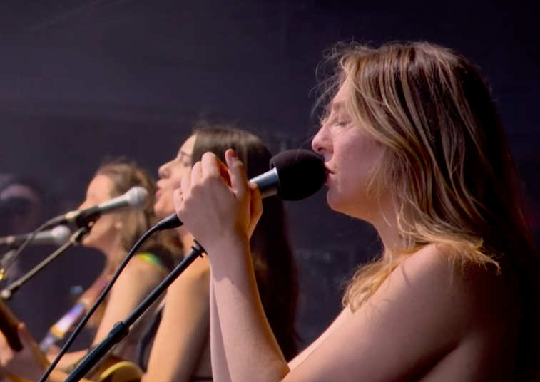 Haim performing on the Pyramid Stage