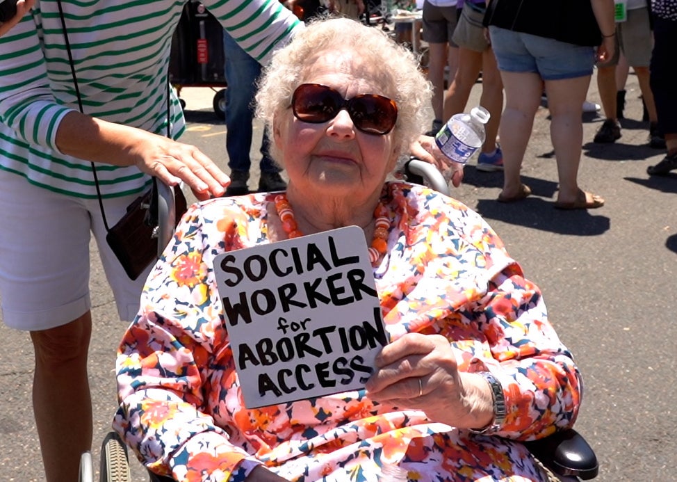 Carol Folk traveled from her assisted living home in Virginia to protest outside the US Supreme Court on Saturday