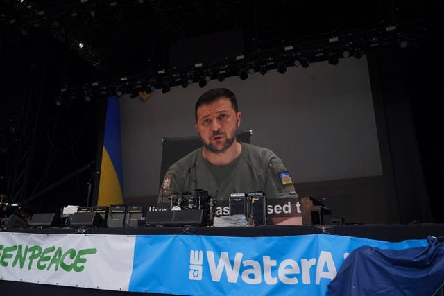 Video message by Ukrainian President Volodymyr Zelensky shown to the crowd at the Glastonbury Festival (Yui Mok/PA)