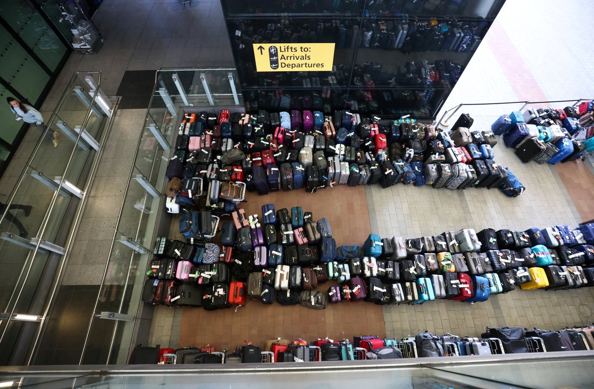 Airport chaos as luggage ‘abandoned’ and passengers ‘forced to sleep on floor’