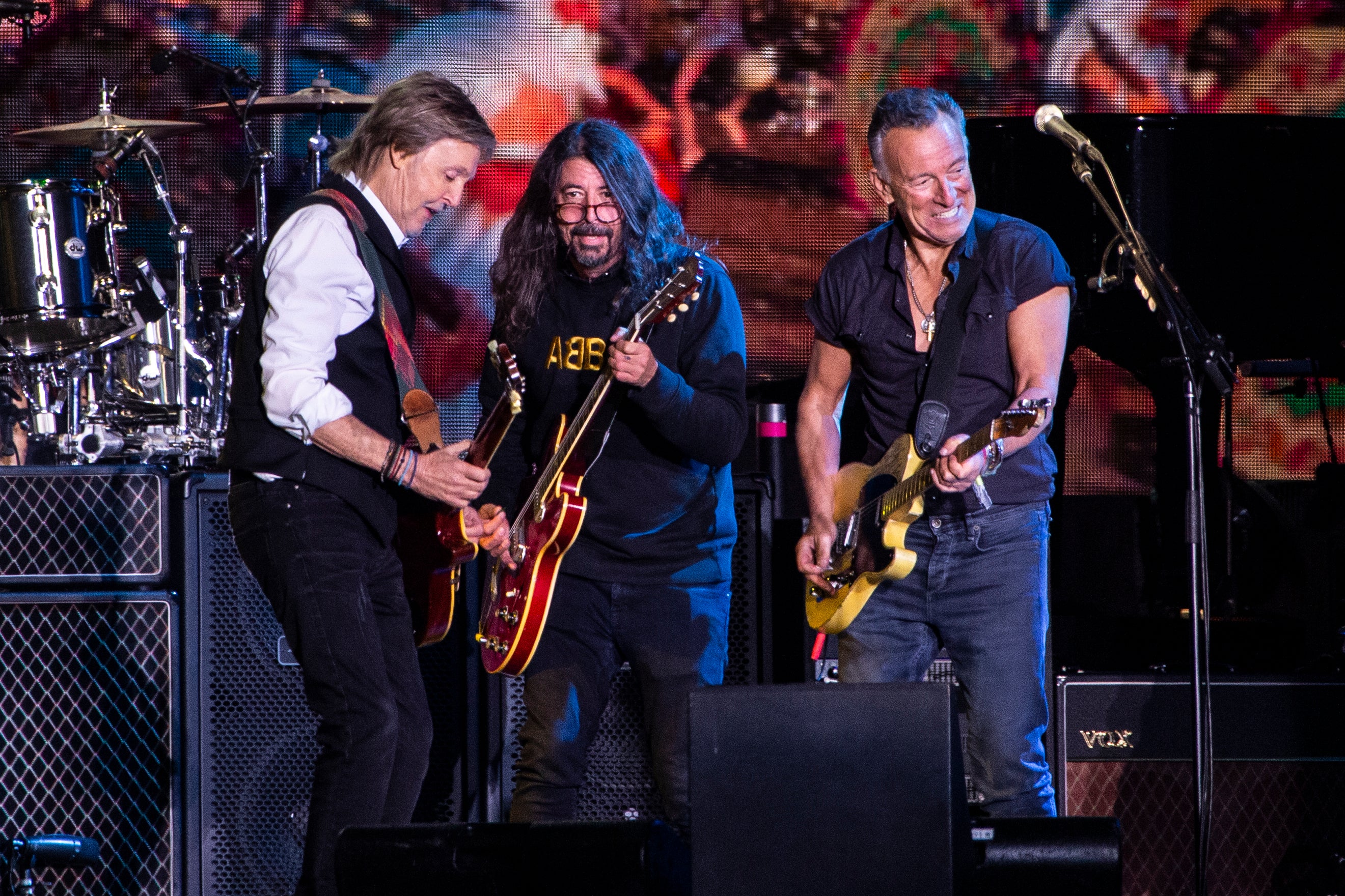 Paul McCartney, from left, Dave Grohl and Bruce Springsteen perform