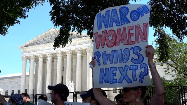 <p>Pro-choice demonstrators protest outside the Supreme Court after Roe v Wade is overturned</p>