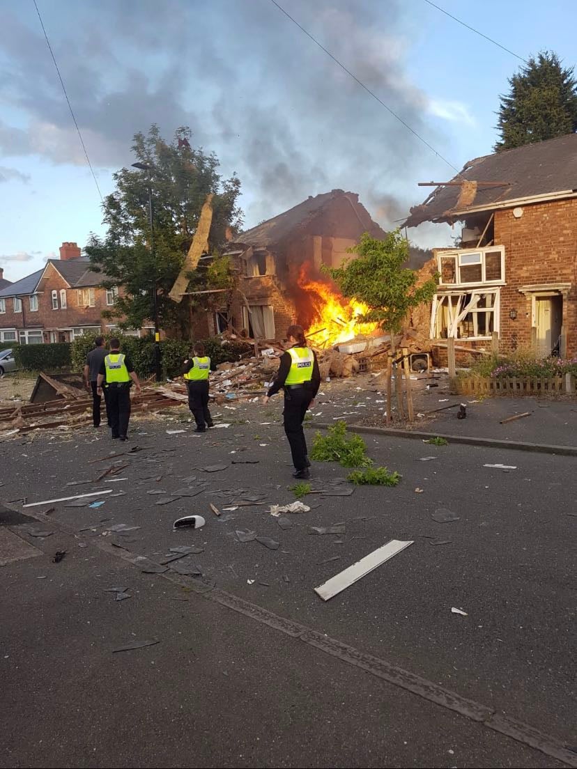 Photos emerged of a blaze at the site of the collapsed house