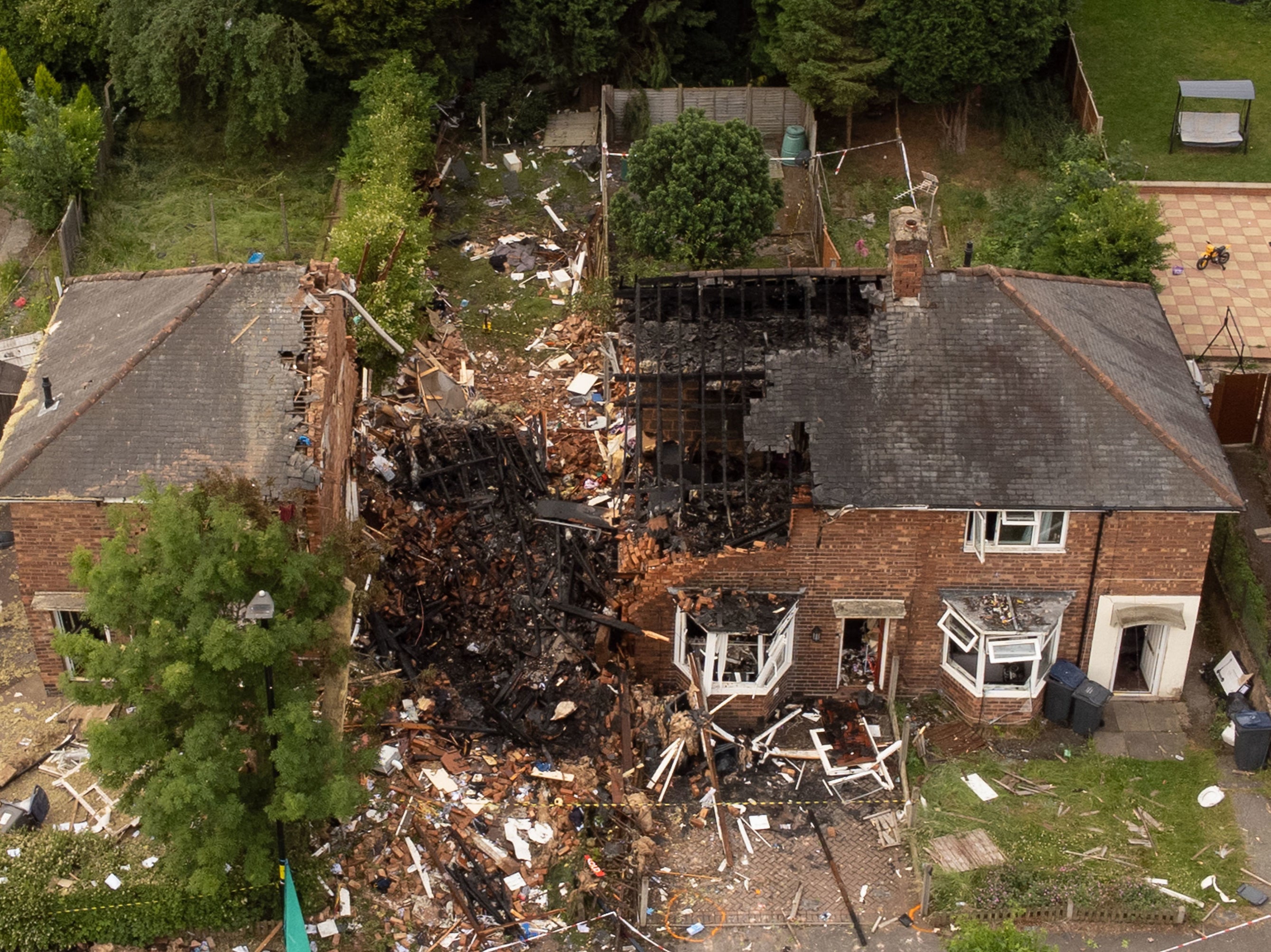 A woman has died and a man has been left critically injured following an explosion at a house in Birmingham