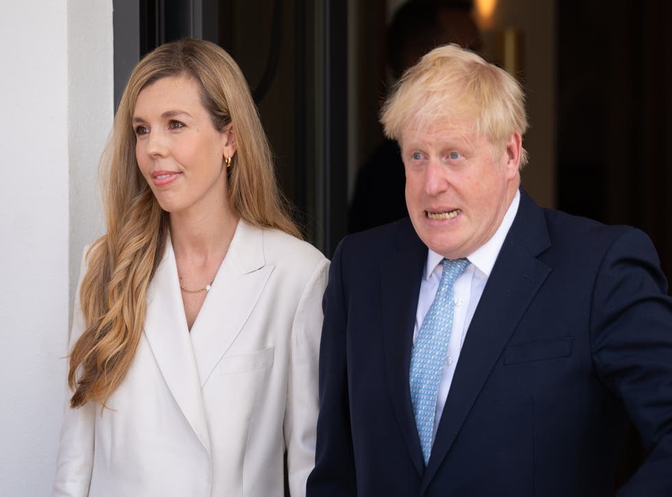 <p>Prime Minister Boris Johnson and his wife Carrie (Stefan Rousseau/PA)</p>