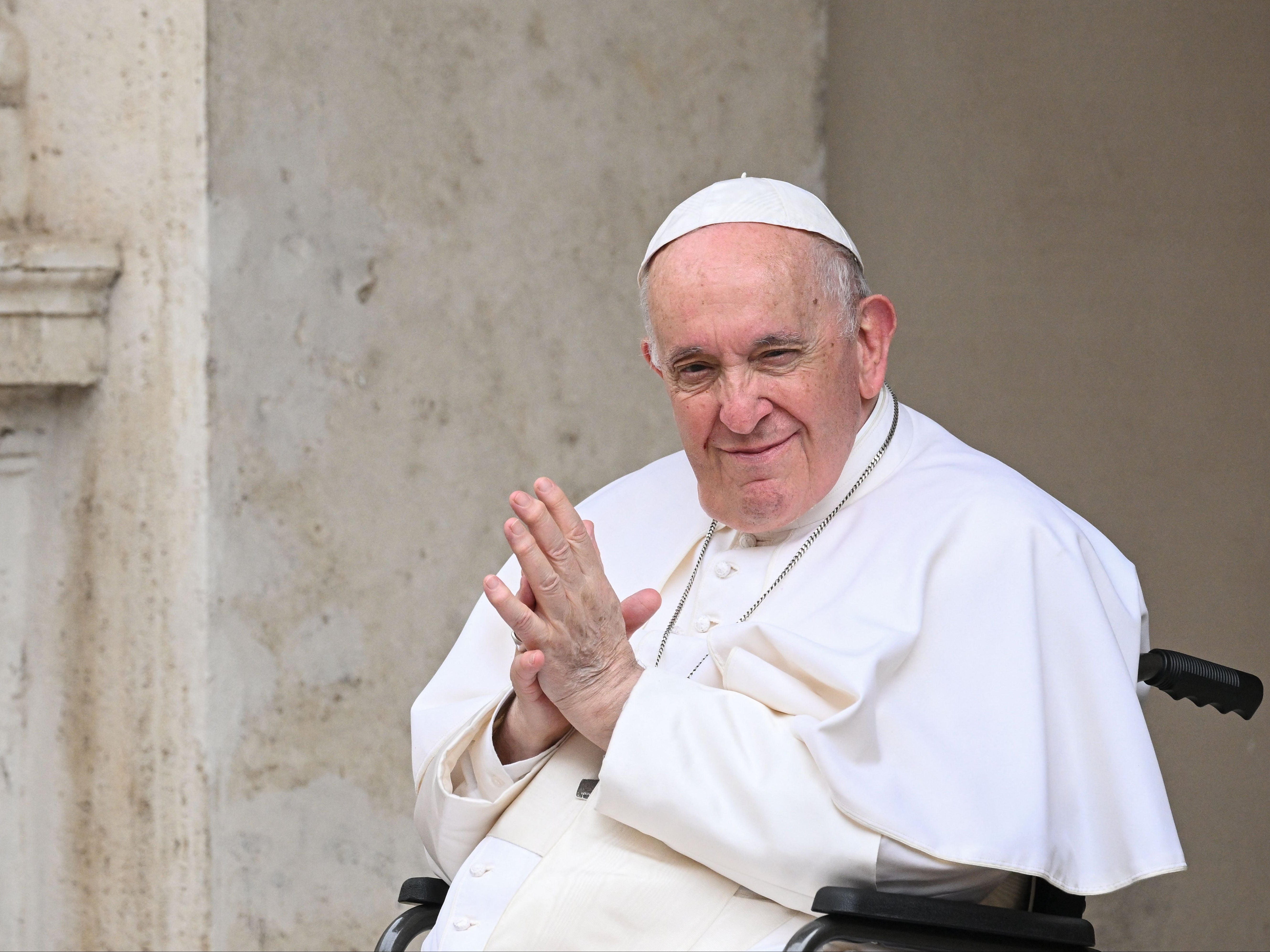 <p>Pope Francis, seated in a wheelchair following knee treatment, presides over "The Cortile dei Bambini"</p>