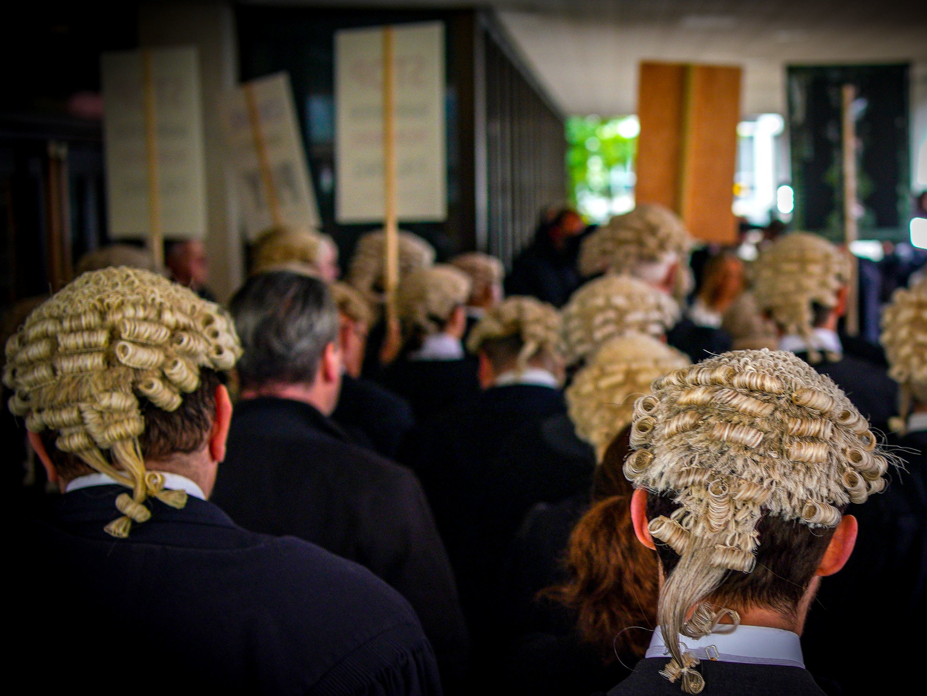 <p>Barristers protesting outside Manchester Crown Court on 27 June 2022</p>