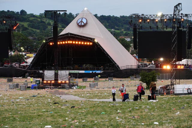 Festival goers leave Worthy Farm in Somerset following the Glastonbury Festival. Picture date: Monday June 27, 2022 (Ben Birchall/PA)