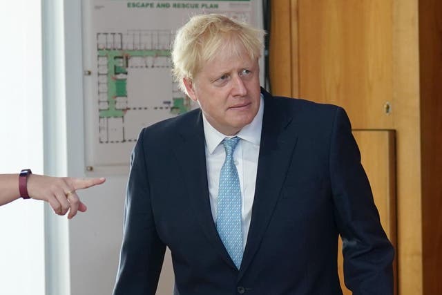 <p>Boris Johnson arrives for TV interviews on the first day of the three-day G7 summit</p>