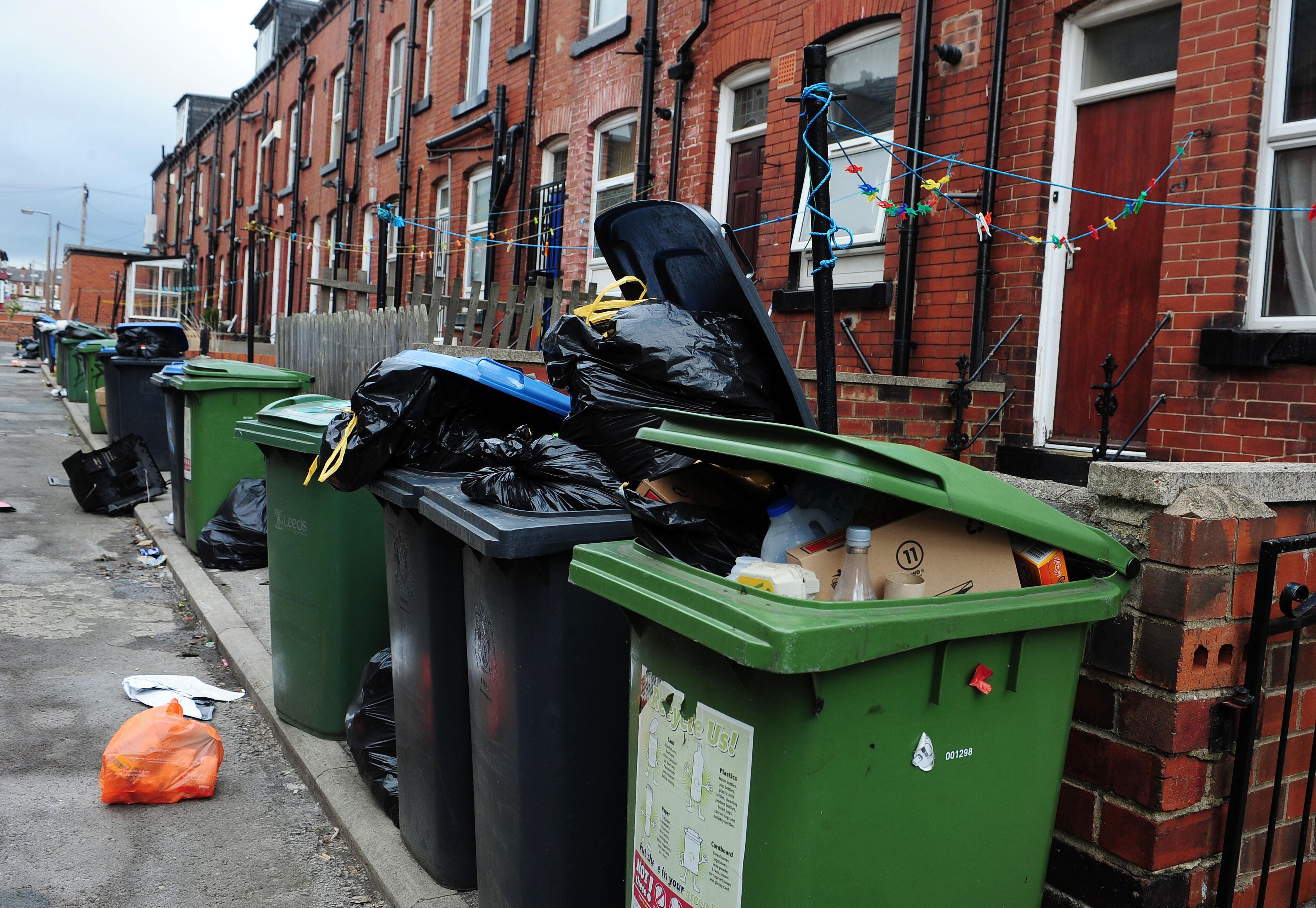 Bags of rubbish and overflowing bins (Anna Gowthorpe/PA)