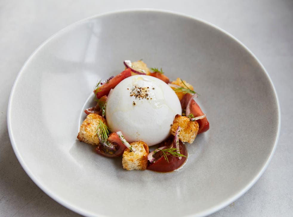 <p>Combine two of your favourite things in this panzanella with burrata </p>