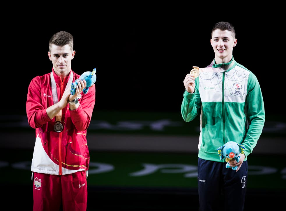 Rhys McClenaghan, right, beat Max Whitlock to gold four years ago (Danny Lawson/PA)