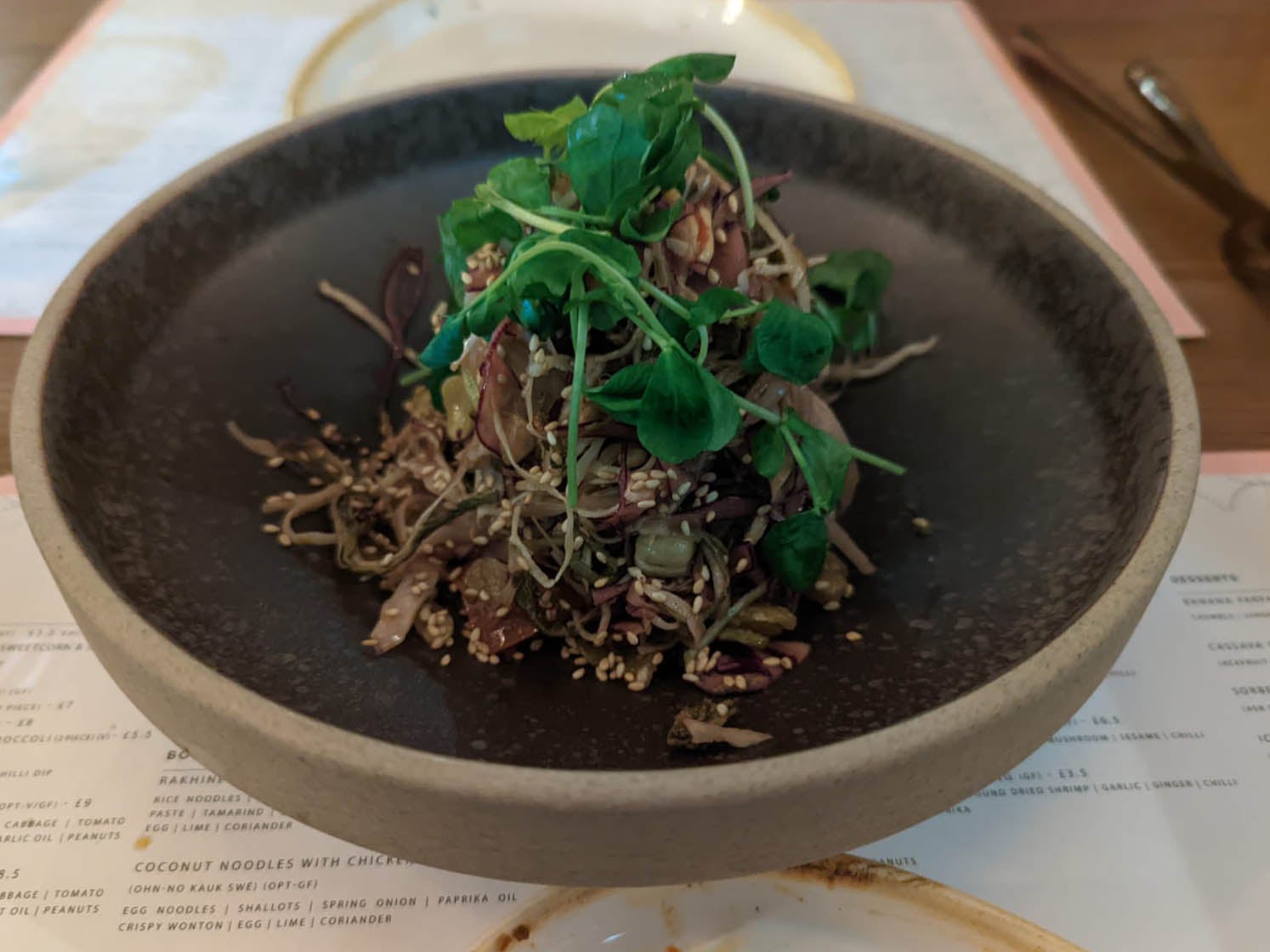 Tealeaf salad is both the restaurant’s and the country’s signature dish