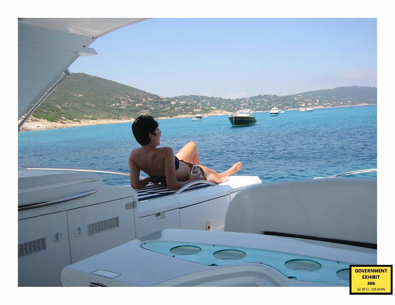 Ghislaine Maxwell sunbathing on a yacht (US Dept of Justice/PA)